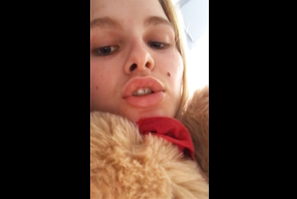 Cute brunette undressing and plays with big teddy bear <!-- width=