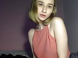 Russian chick shows her firm tits and shaved pussy