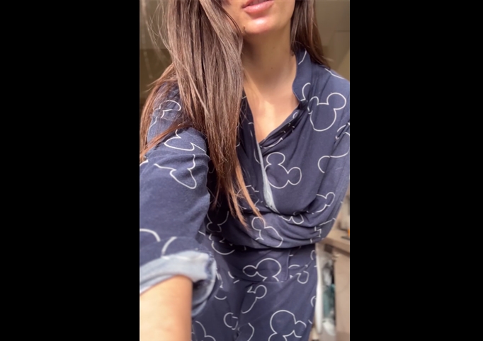 Busty babe stripping and showing it all