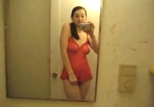 Brunette chick selfshot undressing in the bathroom <!-- width=