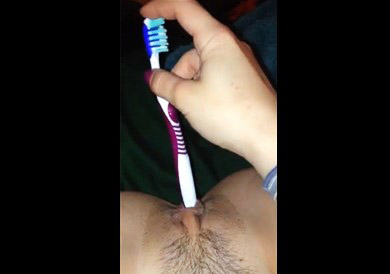 Horny girl herself filming masturbation with toothbrush <!-- width=