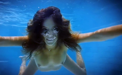 Katya Clover swims underwater