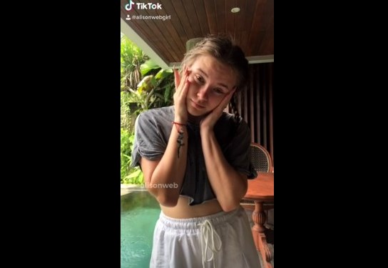 Cute teen shows her tiny tits on TikTok