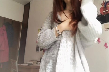 Cute teen takes off her sweater and fingers her tight pussy <!-- width=