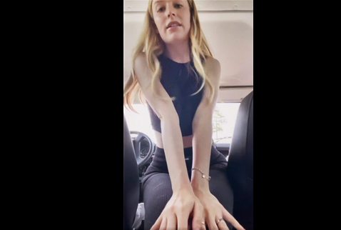 Cute blonde undresses and masturbates in the car