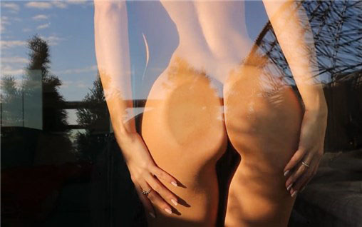 Sexy naked blonde teases in front of the window <!-- width=