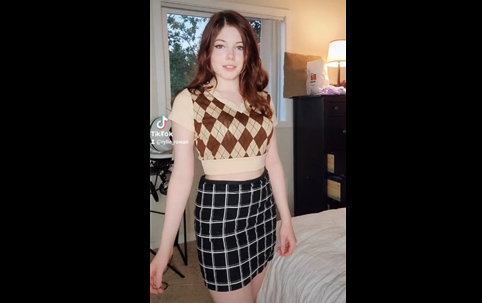 18yo redhead girl shows jumping trick on TikTok <!-- width=