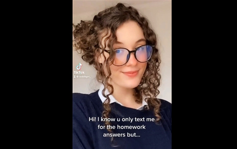 Cute curly brunette teases on TikTok <!-- width=