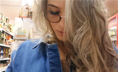 Blonde risky flashing in the supermarket