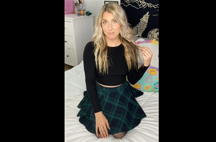 Sexy blonde schoolgirl shows naked trick on TikTok <!-- width=