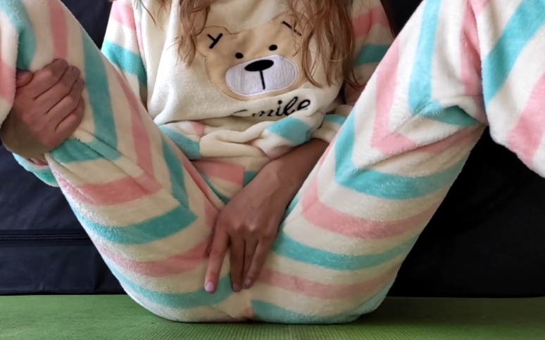 Brunette masturbates in pajamas