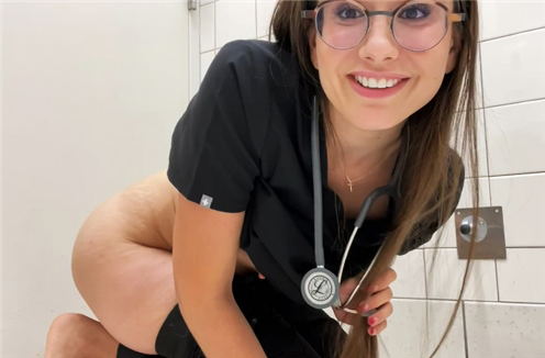 Horny nurse shows her medical device in the anal  <!-- width=