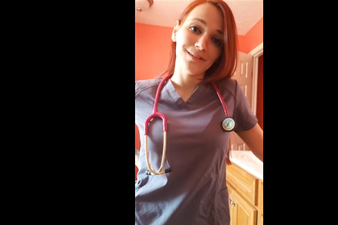 Busty nurse undresses and rides on dildo <!-- width=