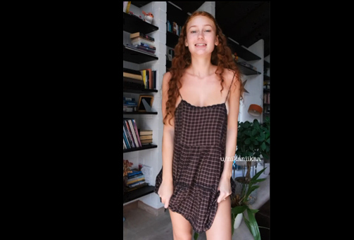 Petite redhead teases in sundress <!-- width=
