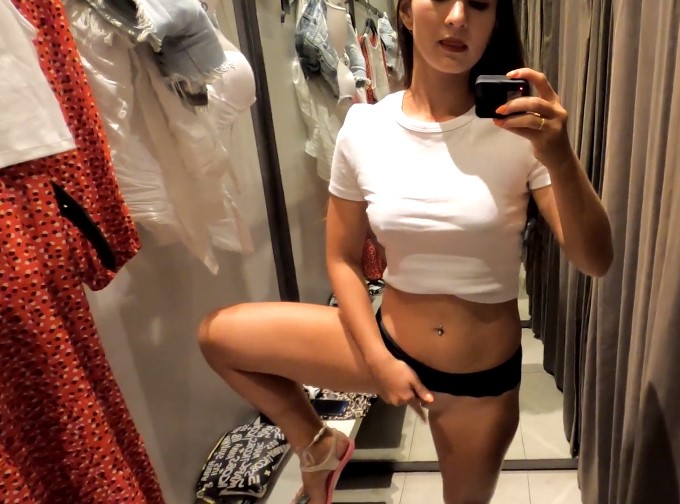 Selfshot rubbing pussy in fitting room <!-- width=