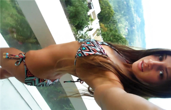 Sexy brunette Melena A shows striptease on balcony <!-- width=
