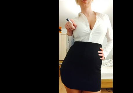Hot busty secretary showing off her big tits <!-- width=