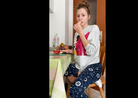 Young girl Nastyaw shows off her tits at breakfast