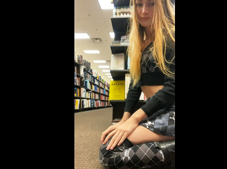 Risky flashing pussy in a bookstore <!-- width=