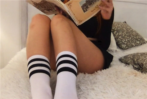 Reading a book without panties