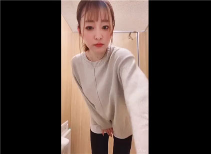 Japanese girl undresses and masturbates on public toilet