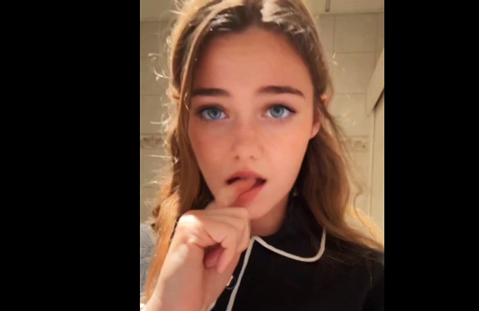 Sexy blue-eyed girl masturbates in a public toilet <!-- width=