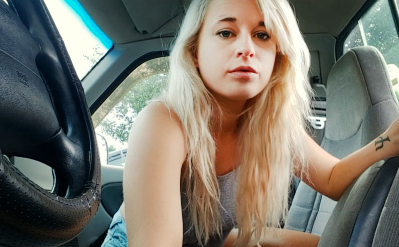 Blonde masturbates naked in truck cab