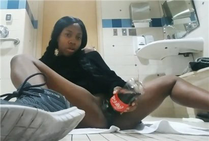 Black girl masturbates with Coca cola bottle in the bathroom <!-- width=