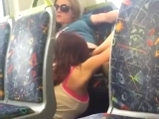 Girl licking girl in train