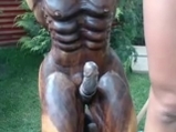 Girl fucks outdoors statue wood