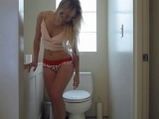 Blonde filmed stripping and masturbation in bathroom <!-- width=
