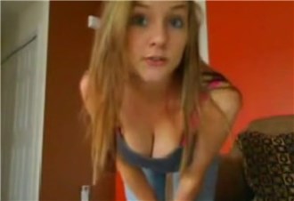 Blonde teen shows her big tits on webcam