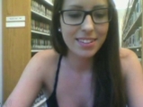 Brunette shows ass and tits in public library <!-- width=