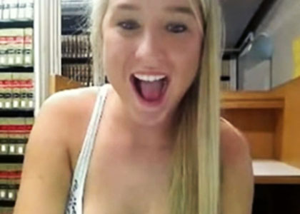 Blonde dildoing pussy in the library