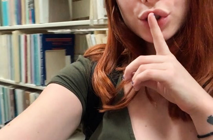 Hot redhead selfshot tits teasing in the library <!-- width=