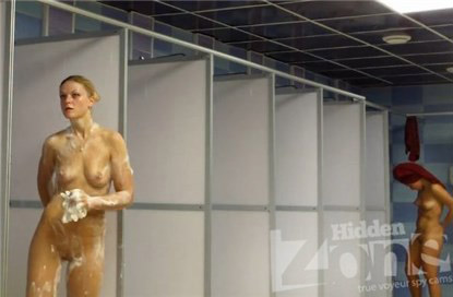 Hidden camera with blonde in womens shower