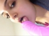 Indian girl sucking her own juices on dildo