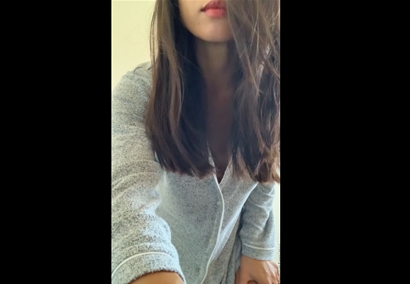 Cute Asian girl undresses and teases with sporty body