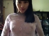 Chinese girl in sexy transparent blouse