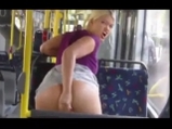 Blonde girl plays with dildo in bus