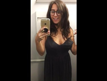 Busty brunette strips in an airplane toilet <!-- width=